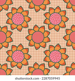 Retro inspired floral gingham seamless vector pattern. Large, bold flowers on a yellow and orange checkered background. Modern vintage style design. Repeat backdrop texture print.