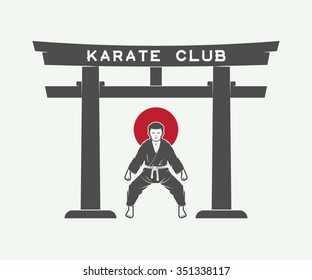 Retro Japanese torii gate with japan flag and karate fighter in vintage style. Vector Illustration