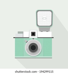 Retro light teal camera with flash and long shadow - Flat modern design