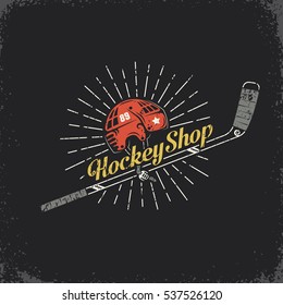 Retro logo for the hockey shop - stick, helmet and inscription. Layered vector illustration - grunge texture, text, background separately and can be easily disabled.