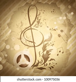 retro magnetic tape with treble clef over abstract floral grunge background