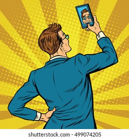 Retro man selfie on smartphone pop art retro vector illustration