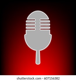 Retro microphone sign. Postage stam or old photo style on red-black gradient background.