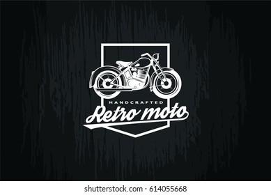 Retro moto logo on black background