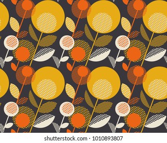 Retro orange and yellow color 60s flower motif. Geometric floral seamless pattern.  vector illustration