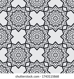 Retro ornament. Geometric pattern. Black ornament on a white background. Seamless texture.
