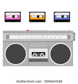 Retro outdated portable stereo boombox radio cassette recorder from 80s and compact audio cassettes. 