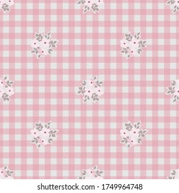 Retro pattern with simple cute flower. Plaid background. Template for fabric design, wallpapers, fashion prints. Feedsack style. Country plant ornament.