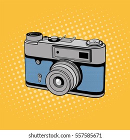 Retro photo camera. Comic background in pop art style. Vector