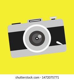 Retro photo camera in flat style on yellow background. Camera vector icon for website or apps. EPS 10
