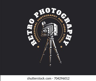 Retro photo camera logo - vector illustration. Vintage emblem design