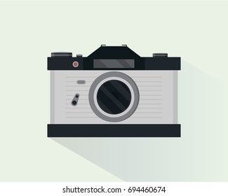 Retro photo camera  with long shadow in flat style. Isolated camera icon. Vector illustration.