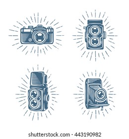 Retro photo cameras set. Hand drawn vector vintage illustration.