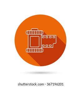 Retro photo icon. Camera roll sign. Round orange web button with shadow.
