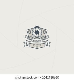 Retro photography badge or label design, Logo for studio and photographer or videographer with shield symbol and camera lens symbol. Photography logo template