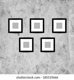 Retro picture frames on grunge wall for your design