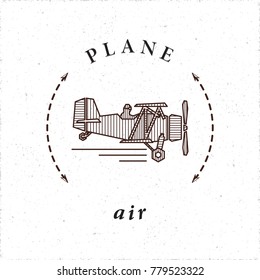 Retro Plane aka Biplane Aircraft Logo Style Icon in Connection with Air as One of Main Elements - Black and Brown Elements on White Grunge Background - Vector Contrast Graphic Style