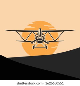 Retro plane landing on desert with sunset. Vintage plane illustration.