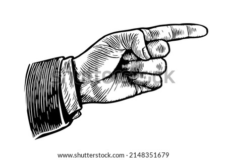 Retro pointing hand. Hand drawn sketch in vintage style. Vector illustration