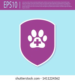 Retro purple Animal health insurance icon isolated on turquoise background. Pet protection icon. Dog or cat paw print. Vector Illustration
