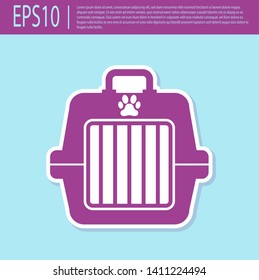 Retro purple Pet carry case icon isolated on turquoise background. Carrier for animals, dog and cat. Container for animals. Animal transport box. Vector Illustration