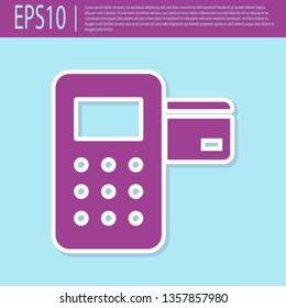 Retro purple Pos terminal with inserted credit card icon isolated on turquoise background. Payment terminal transaction. Flat design. Vector Illustration