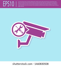 Retro purple Security camera with screwdriver and wrench icon isolated on turquoise background. Adjusting, service, setting, maintenance, repair, fixing.  Vector Illustration