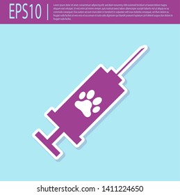 Retro purple Syringe with pet vaccine icon isolated on turquoise background. Dog or cat paw print. Vector Illustration