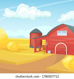 Retro red American barn in an agricultural field. Farming, harvest. Subsistence farming.