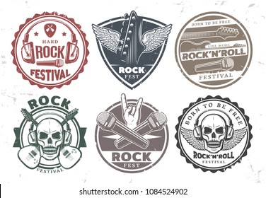 Retro rock music stamps set with inscriptions headphones microphones electric guitars skull wings mediator isolated vector illustration