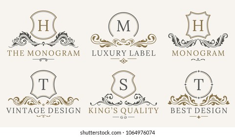 Retro Royal Vintage Shields Logotype set. Vector calligraphic Luxury logo design elements.  