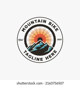 Retro seal emblem badge sun of mountain bike logo design on white background