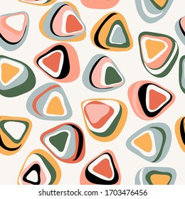 Retro seamless pattern from the 50s and 60s. Seamless abstract Vintage background in sixties style. Organic background. Colorful Geometric pattern from triangles. Vector illustration. Stamp texture