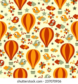 Retro seamless pattern with birds, flowers, clouds and hot air balloons.