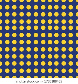 Retro seamless pattern. Colored polka dots. Blue with yellow. Suitable for printing on textiles or paper or as a background for the web.