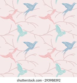 Retro seamless pattern of flying birds with ornaments on branches of trees in style of zentangle