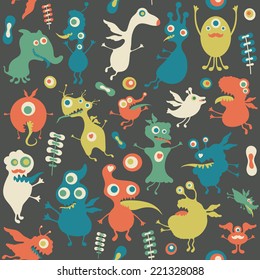 Retro seamless pattern with monsters and flowers.