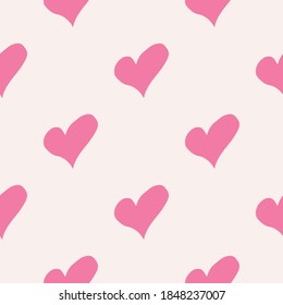 Retro seamless pattern. Pink hearts on beige background