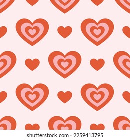 Patrón retro sin fisuras con corazones rosados y rojos