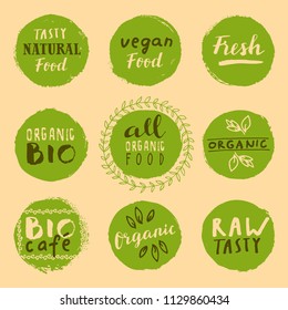 Retro set of fresh tasty raw bio, organic, vegan, healthy food labels. Hand drawn logo templates with floral and vintage elements for restaurant menu or food package. Vector badges in hipster style