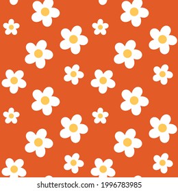 Retro style daisy flowers on an orange background. Seamless repeating vector pattern.