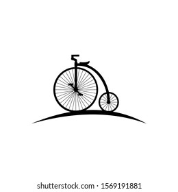Retro style hand drawn circus bicycle with big front wheel vector illustration,  black silhouette isolated
