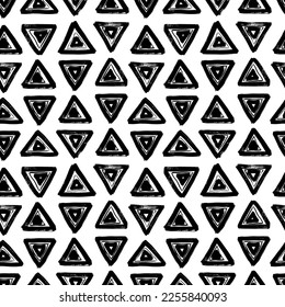 Retro style hand drawn seamless pattern with triangles. Trendy endless geometric background.

