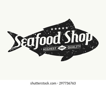 Retro styled fish silhouette seafood shop label