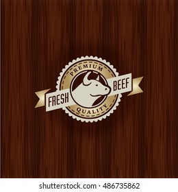 retro styled gold metallic emblem of butcher meat store stamp on antique wood texture bovine butcher animal classic product meat ranch cutlery swine natural fatal metal blaze nutrient pig timber marke