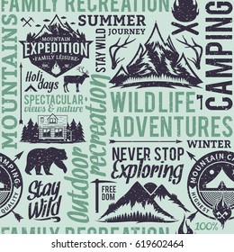 Retro styled typographic vector mountain and outdoor adventures seamless pattern or background.