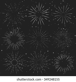Retro Sunburst set on dark background.  Vintage vector sun rays for your logo, badge, cover or some design.