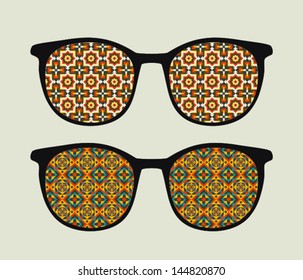 Retro sunglasses with  ornament reflection in it. Vector illustration of accessory - eyeglasses isolated.