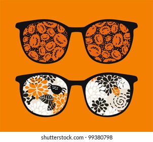 Retro sunglasses with pumpkins reflection in it. Vector illustration of accessory - eyeglasses isolated.
