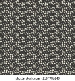 Retro, thick fabric with a pattern consisting of pixels, stitches and rectangular patches. The texture of a wool or cotton bedspread. Monochrome graphics.